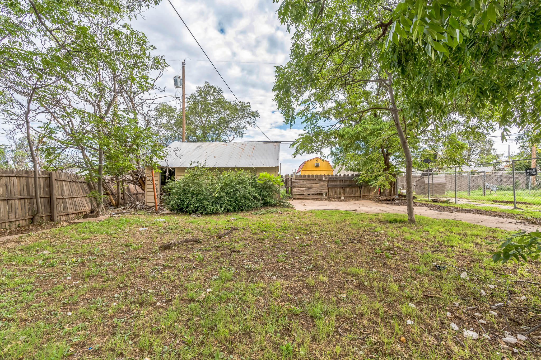1510 33rd Street Lubbock, TX 79411 - Photo 6 of 33 a view of a back yard