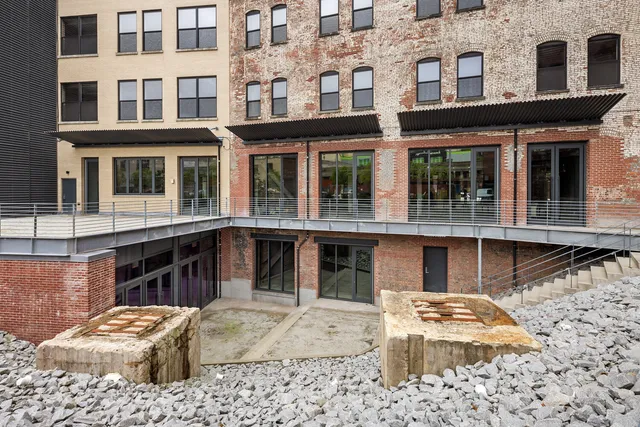 a front view of a building with windows