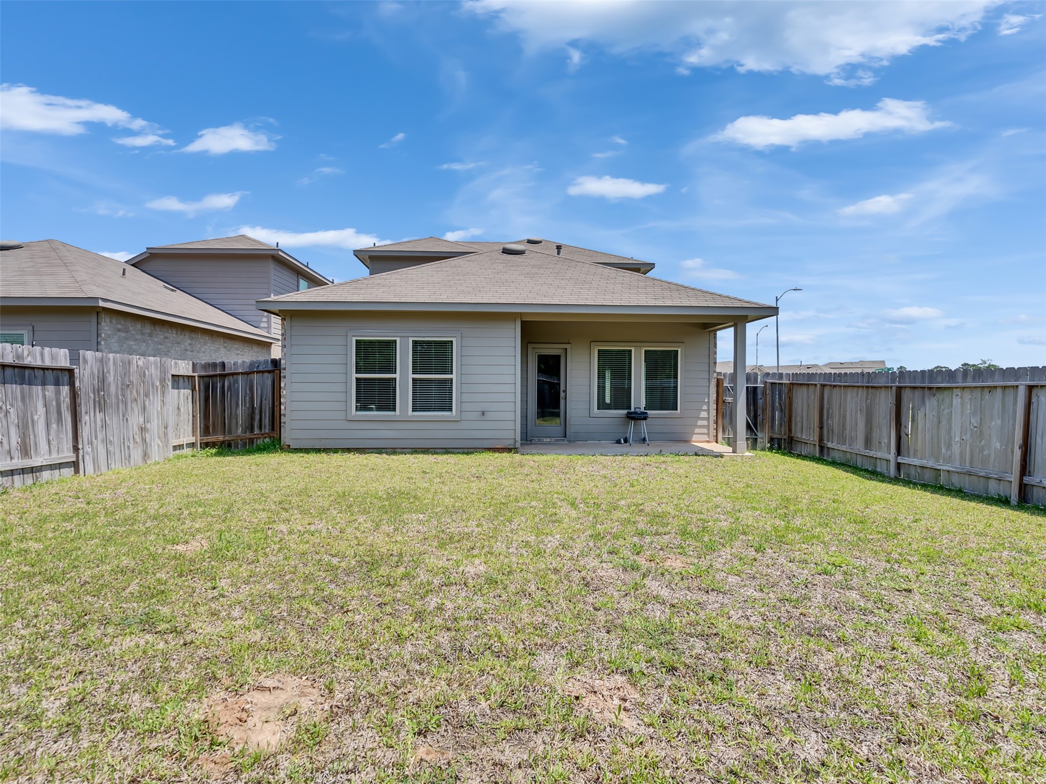 22503 Aspen Tarn Trail Spring, TX 77373 - Photo 30 of 30 a view of a house with backyard and porch