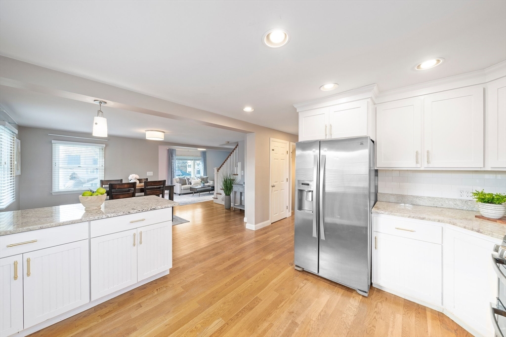 91 Prospect Street Canton, MA 02021 - Photo 16 of 41 a kitchen with stainless steel appliances a refrigerator sink and white cabinets