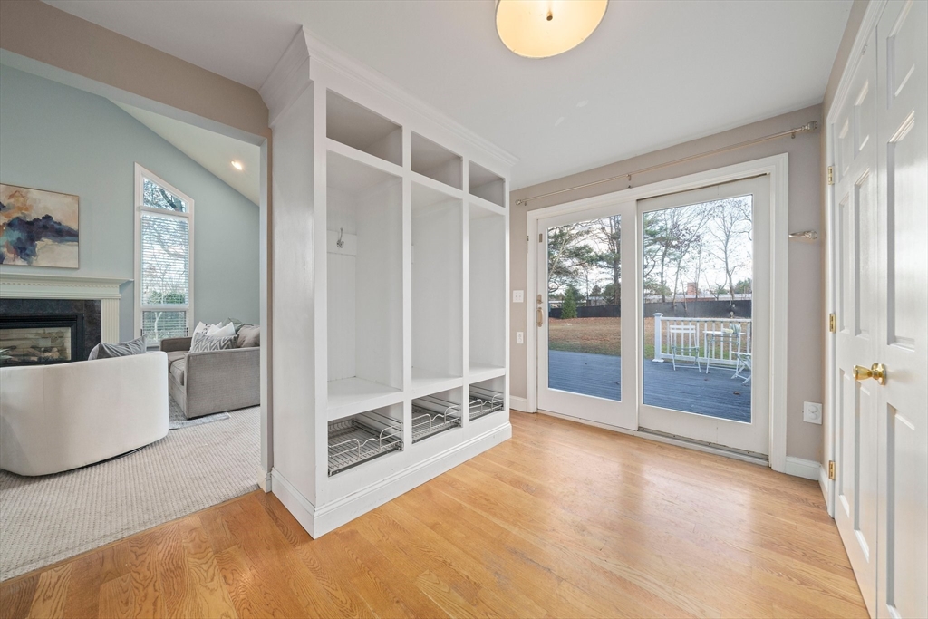 91 Prospect Street Canton, MA 02021 - Photo 17 of 41 a view of an empty room with wooden floor and a window