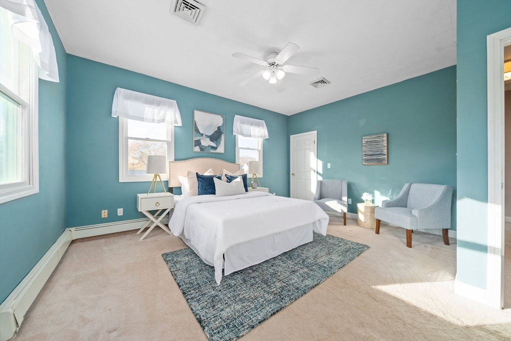 91 Prospect Street Canton, MA 02021 - Photo 19 of 41 a bedroom with a bed and window