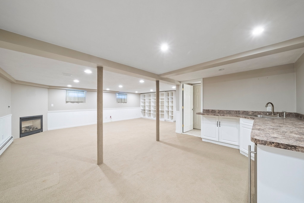 91 Prospect Street Canton, MA 02021 - Photo 26 of 41 a view of a kitchen with a sink and cabinets