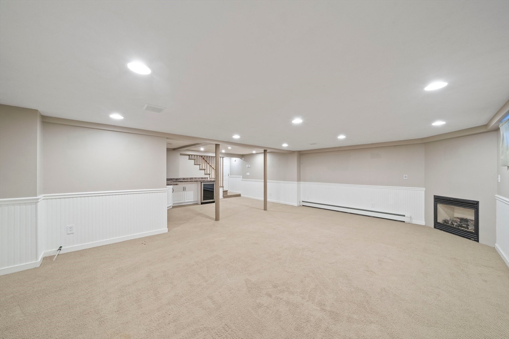 91 Prospect Street Canton, MA 02021 - Photo 28 of 41 an empty room with kitchen and natural light