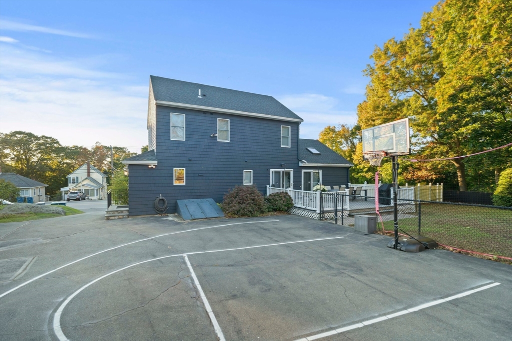 91 Prospect Street Canton, MA 02021 - Photo 31 of 41 a front view of a house with a garden