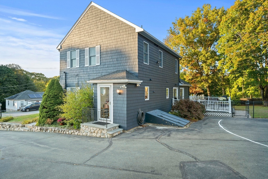 91 Prospect Street Canton, MA 02021 - Photo 35 of 41 a view of a house with a yard