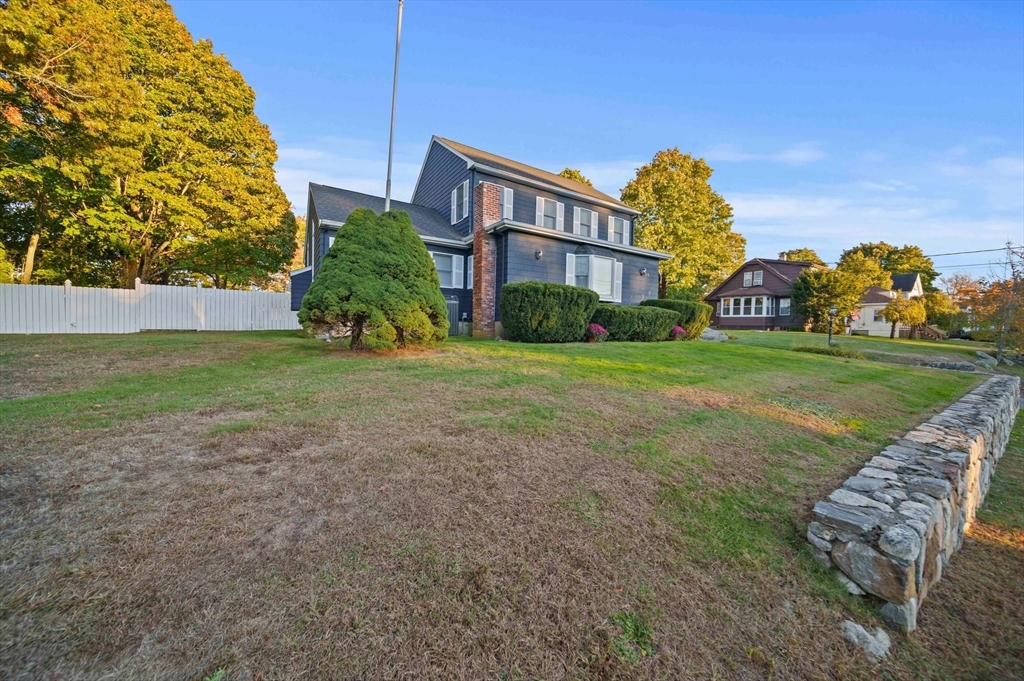 91 Prospect Street Canton, MA 02021 - Photo 37 of 41 a view of a big yard next to a house