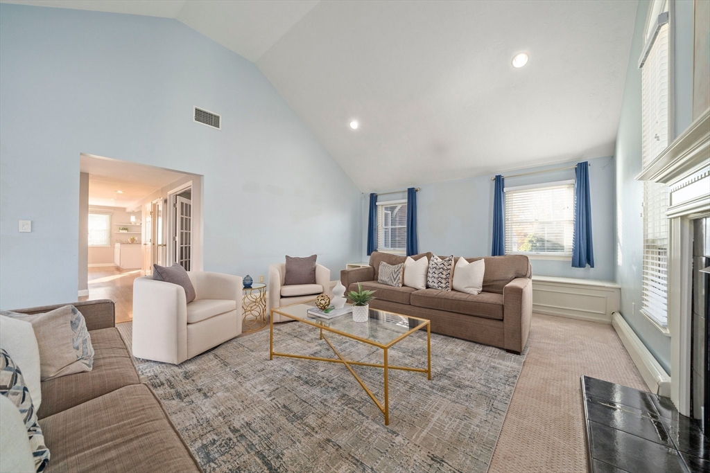 91 Prospect Street Canton, MA 02021 - Photo 5 of 41 a living room with furniture and a large window