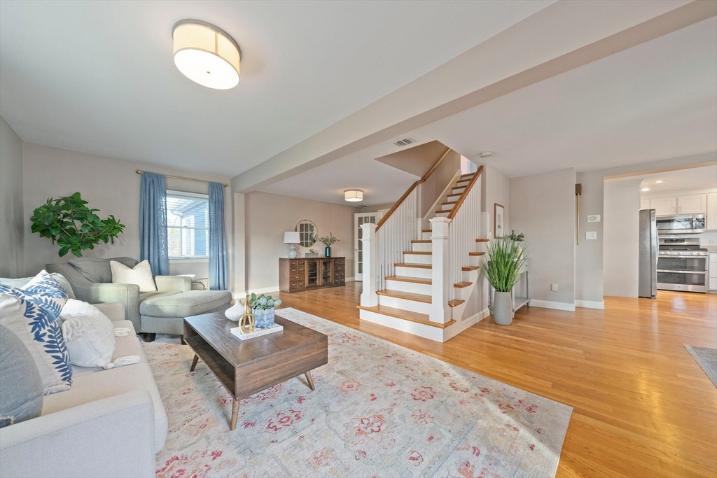 91 Prospect Street Canton, MA 02021 - Photo 7 of 41 a living room with furniture and wooden floor