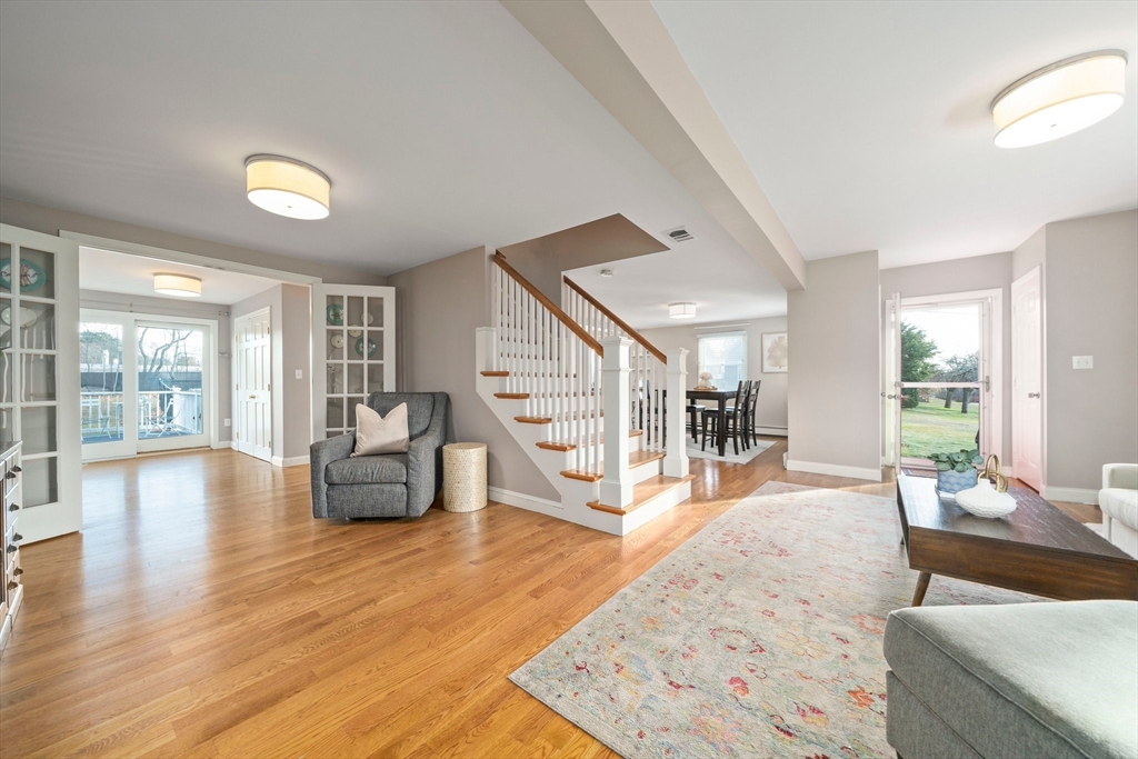 91 Prospect Street Canton, MA 02021 - Photo 10 of 41 a living room with furniture and a wooden floor