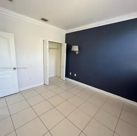 an empty room with cabinet