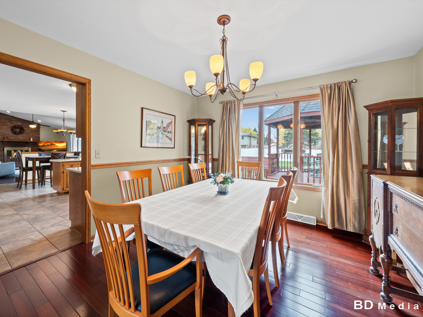 1525 Cimarron Drive New Lenox, IL 60451 - Photo 11 of 41 a view of a dining room with furniture window and wooden floor
