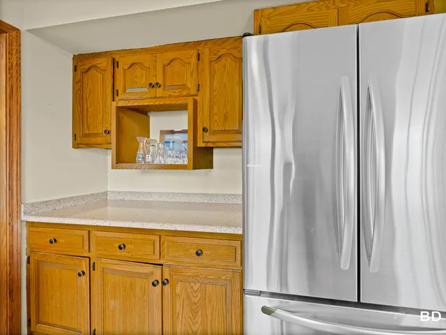a bathroom with a shower and a mirror