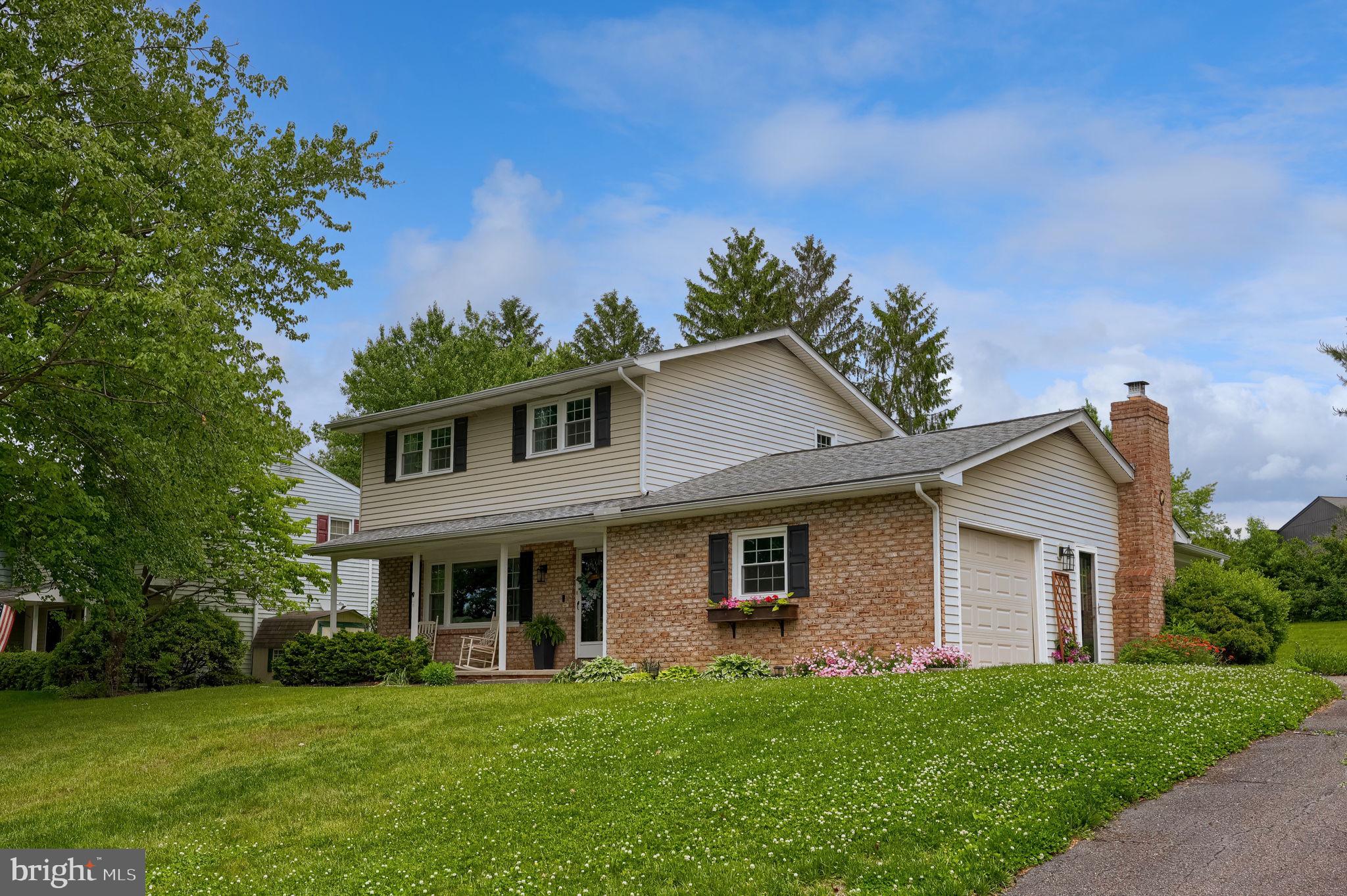 1019 Devonshire Road Lancaster, PA 17601 - Photo 3 of 35 a front view of a house with a garden