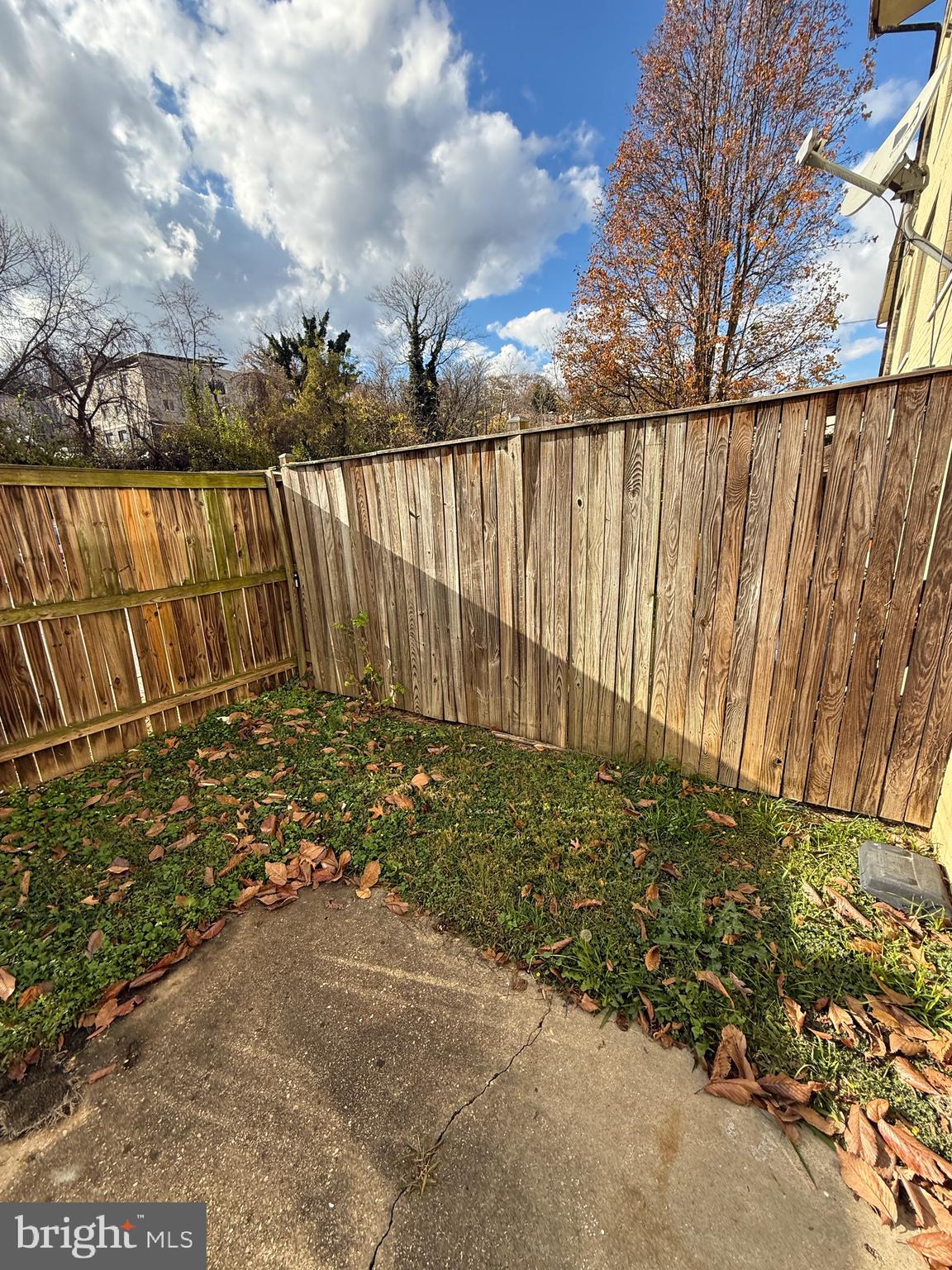 3103 Naylor Road Southeast, Unit B Washington, DC 20020 - Photo 14 of 16 a view of outdoor space with wooden fence