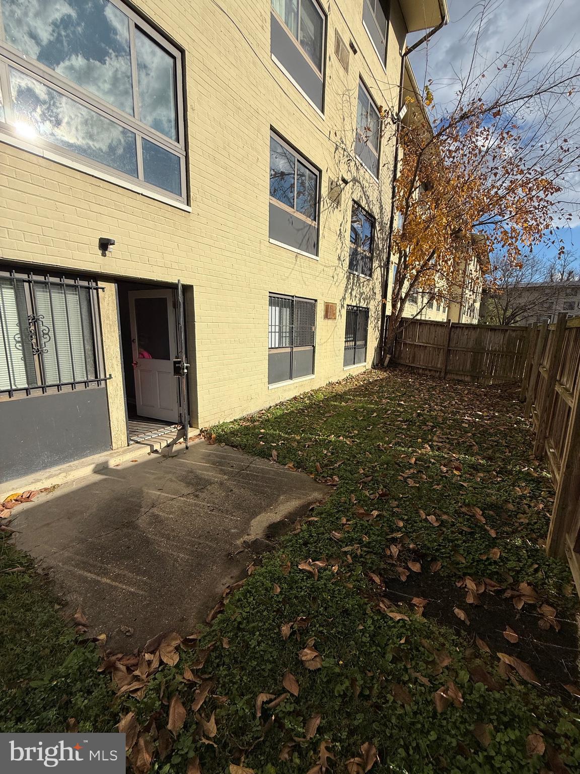 3103 Naylor Road Southeast, Unit B Washington, DC 20020 - Photo 15 of 16 a view of a house with a backyard