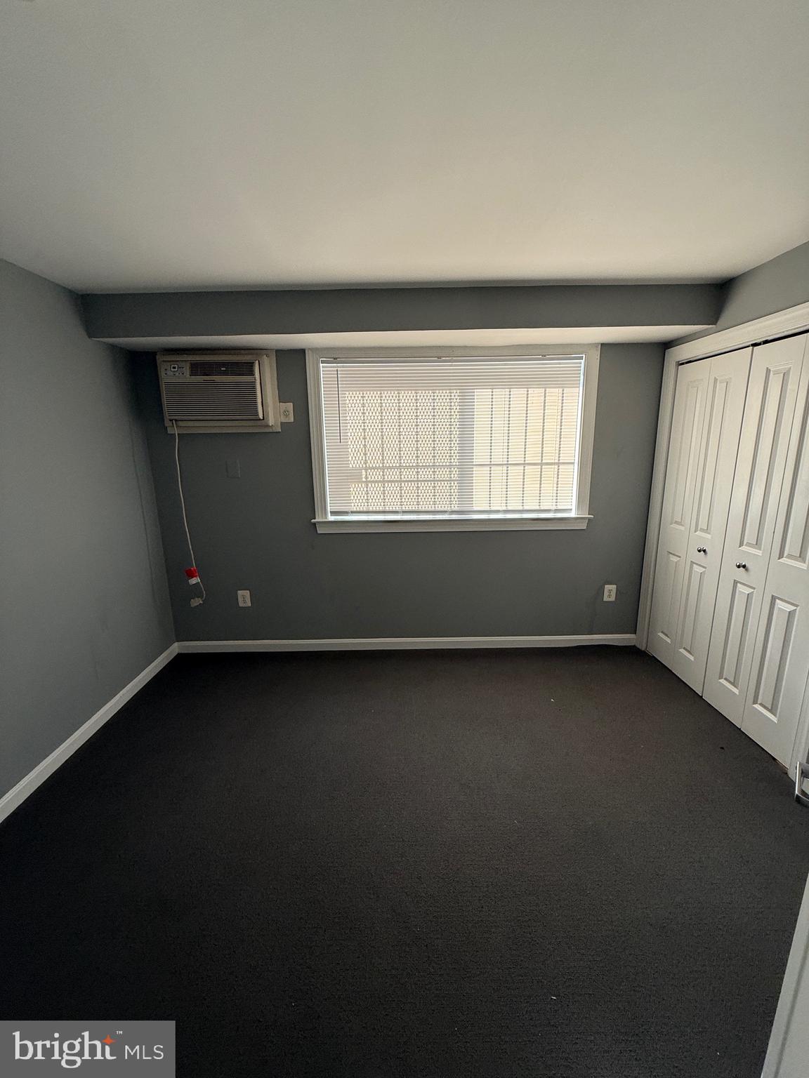3103 Naylor Road Southeast, Unit B Washington, DC 20020 - Photo 8 of 16 an empty room with a window
