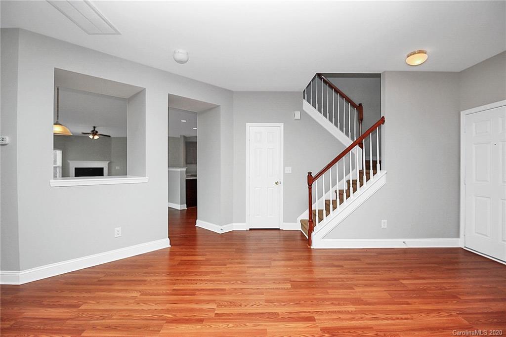 9522 Seamill Road Charlotte, NC 28278 - Photo 13 of 43 a view of entryway and hall with wooden floor