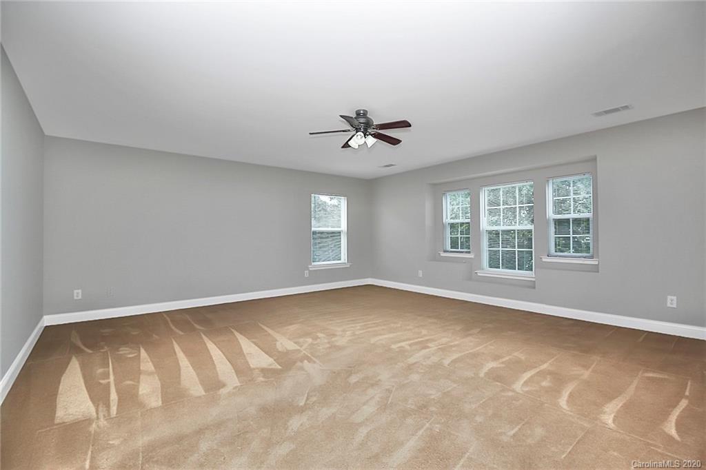9522 Seamill Road Charlotte, NC 28278 - Photo 24 of 43 wooden floor in an empty room with a window