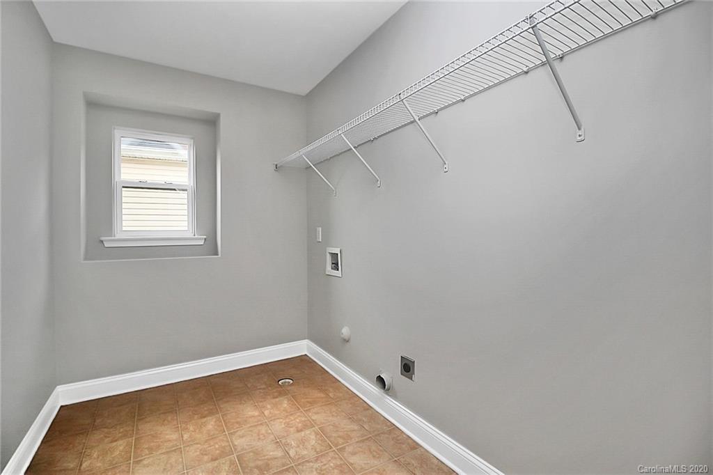 9522 Seamill Road Charlotte, NC 28278 - Photo 26 of 43 a view of a small space with wooden floor and a window