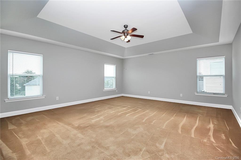 9522 Seamill Road Charlotte, NC 28278 - Photo 27 of 43 a view of an empty room with a window