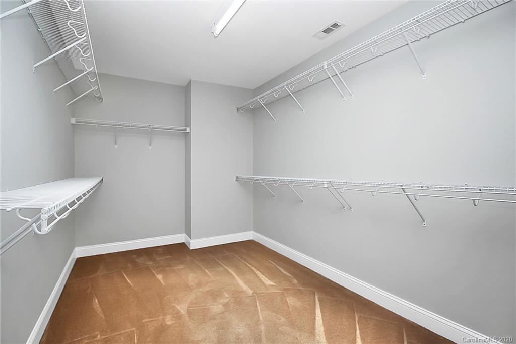 9522 Seamill Road Charlotte, NC 28278 - Photo 31 of 43 a view of a room with racks on the wall