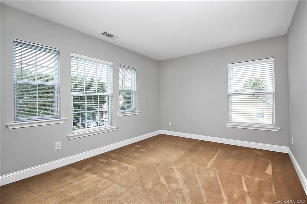 9522 Seamill Road Charlotte, NC 28278 - Photo 32 of 43 an empty room with a window