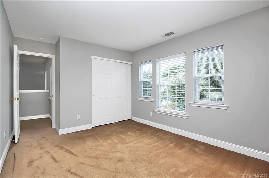 9522 Seamill Road Charlotte, NC 28278 - Photo 33 of 43 a view of an empty room with a window