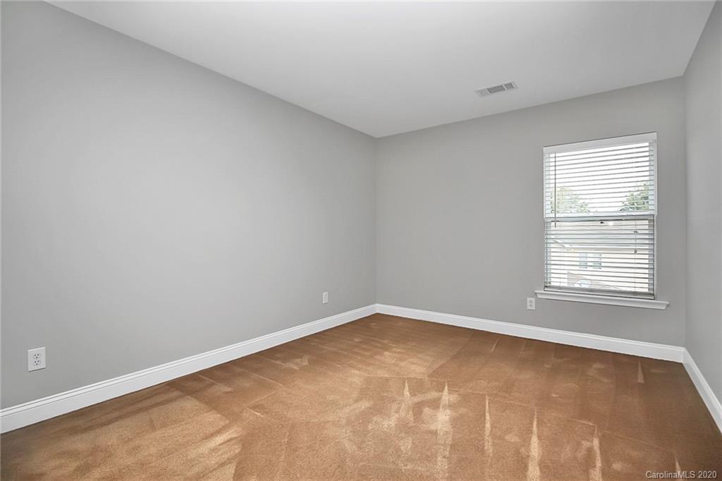 9522 Seamill Road Charlotte, NC 28278 - Photo 34 of 43 an empty room with a window