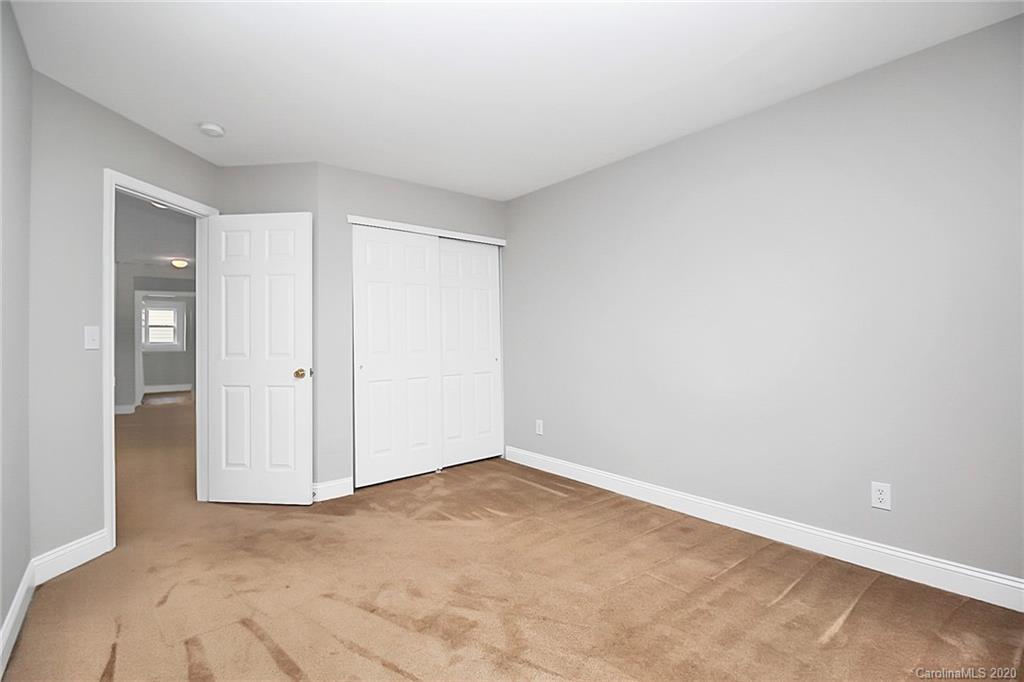 9522 Seamill Road Charlotte, NC 28278 - Photo 35 of 43 a view of an empty room