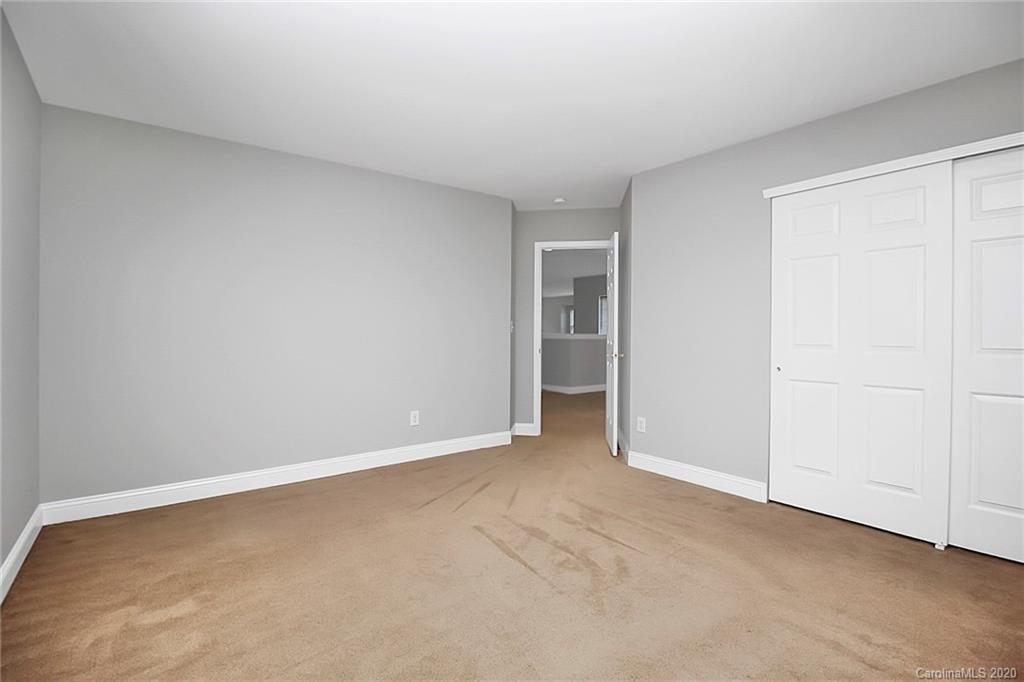 9522 Seamill Road Charlotte, NC 28278 - Photo 37 of 43 a view of an empty room and closet area