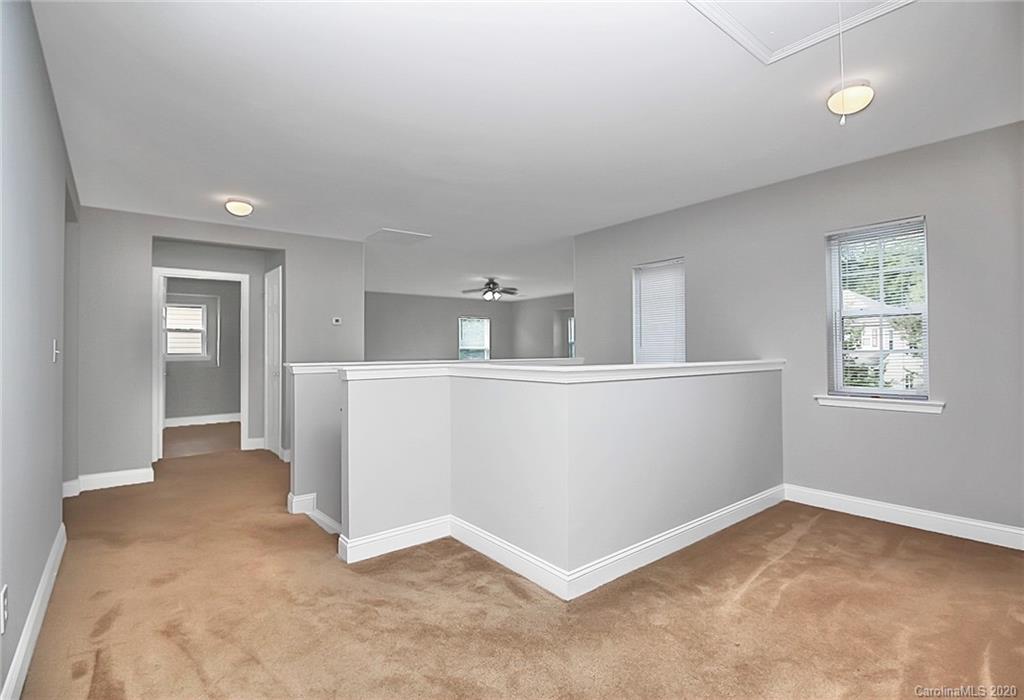9522 Seamill Road Charlotte, NC 28278 - Photo 39 of 43 a view of a kitchen with furniture and wooden floor