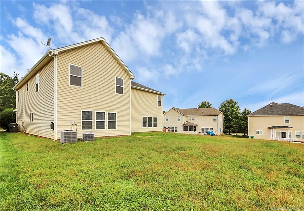 9522 Seamill Road Charlotte, NC 28278 - Photo 42 of 43 a view of a house with a yard