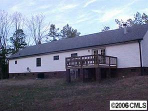 1343 Cline School Road Concord, NC 28025 - Photo 2 of 8 a view of a house with a yard