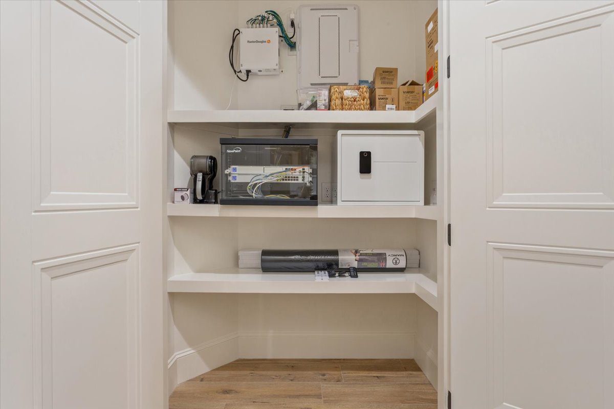 309 Highland Spring Lane Georgetown, TX 78633 - Photo 28 of 40 One of the 3 spacious closets in between the Primary Bedroom & 2nd Bedroom contains the home's computer equipment. This equipment stays with the home.