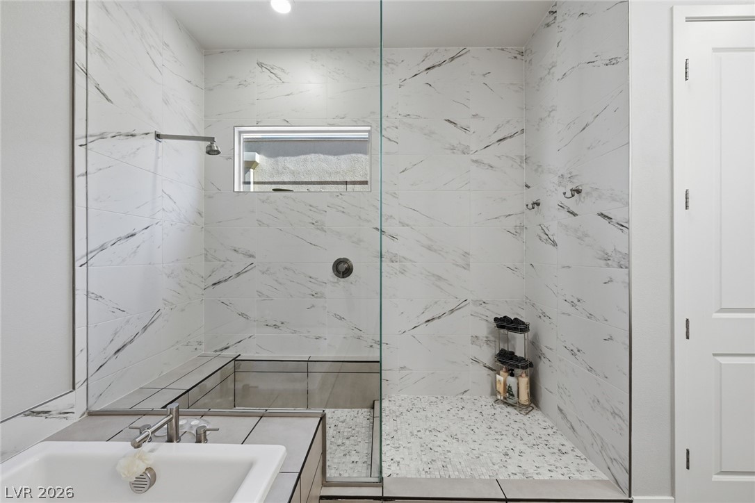 4246 Swift Street Las Vegas, NV 89135 - Photo 42 of 71 Bathroom featuring a marble finish shower and a bath
