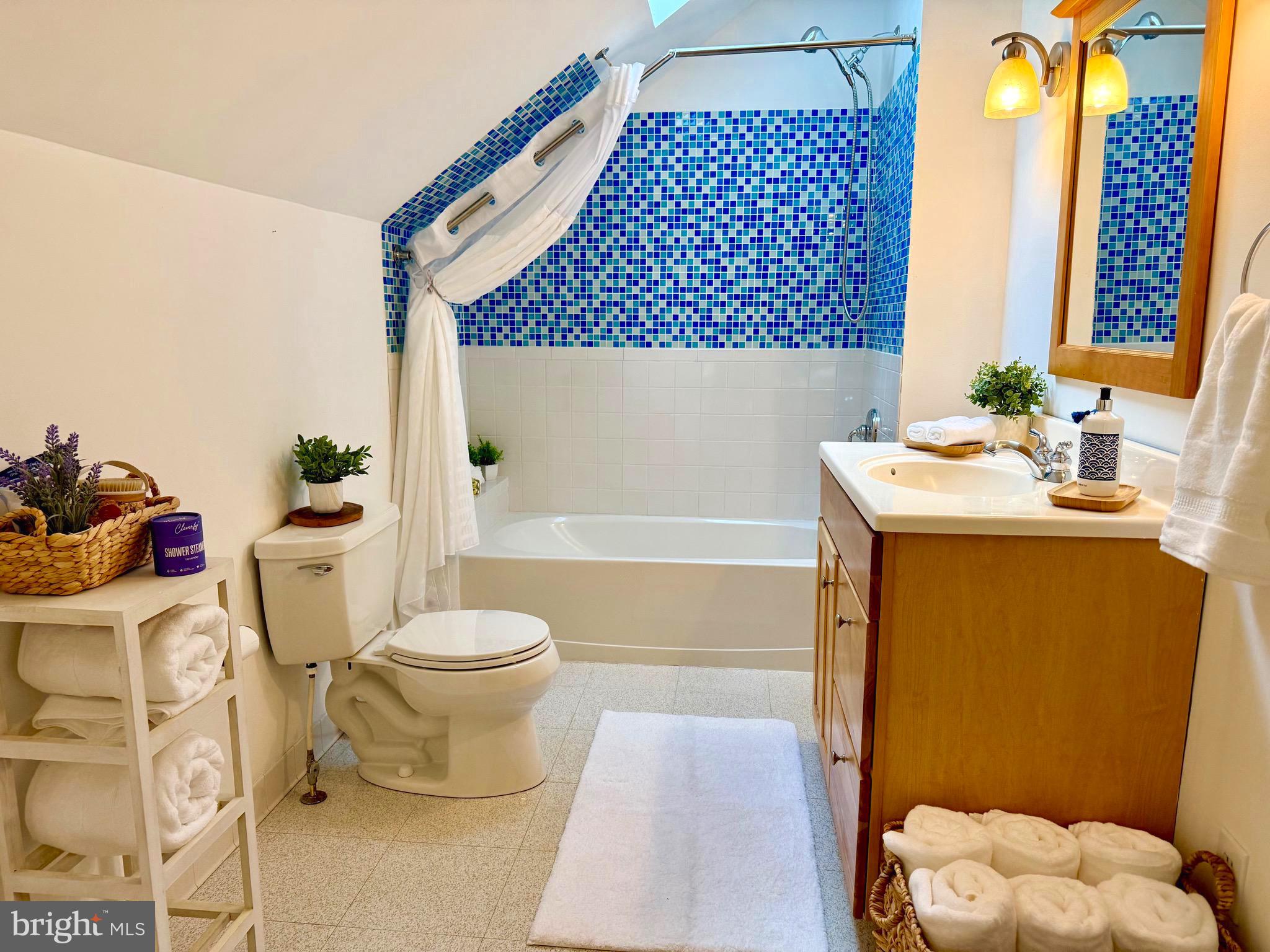 348 Trapper Ridge Lane Hedgesville, WV 25427 - Photo 18 of 41 a bathroom with a sink toilet and shower