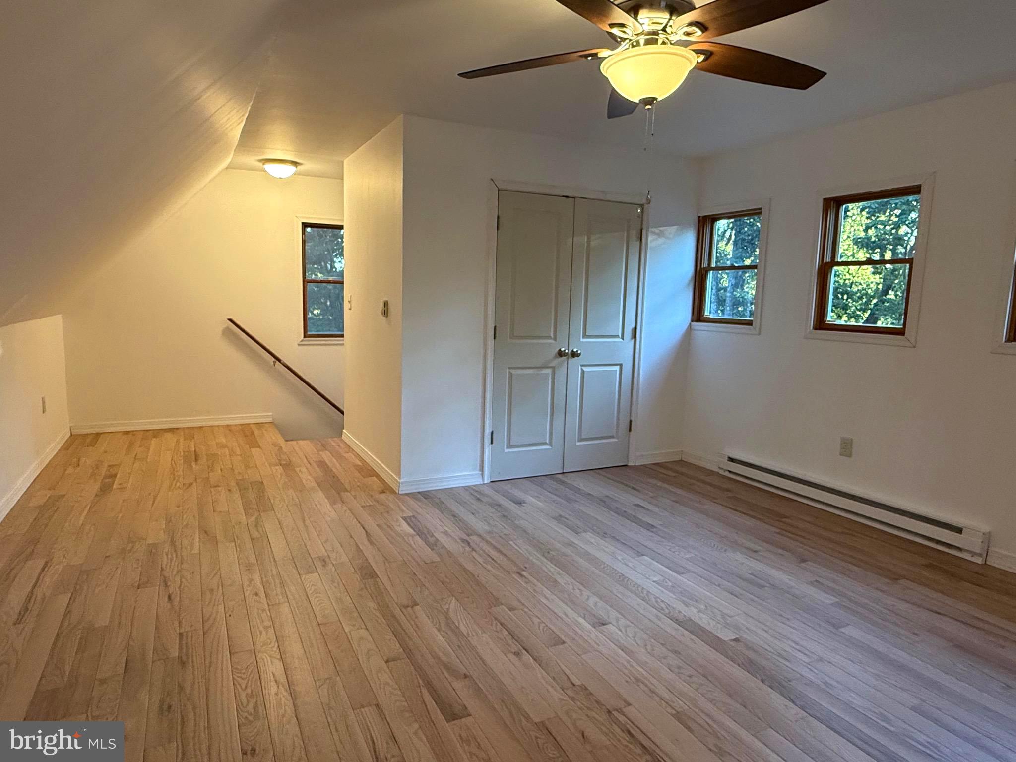 348 Trapper Ridge Lane Hedgesville, WV 25427 - Photo 20 of 41 wooden floor in an empty room with a window