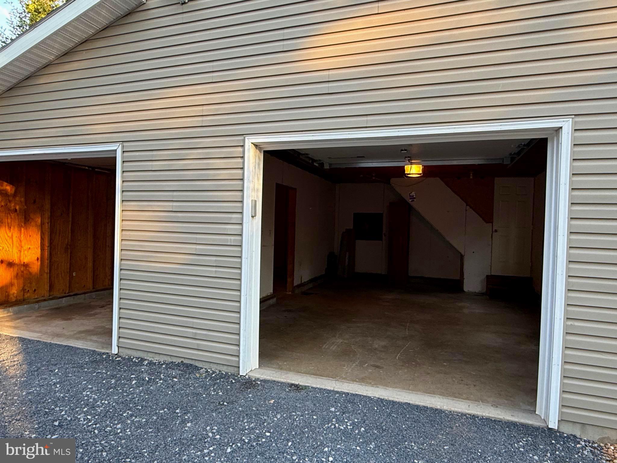 348 Trapper Ridge Lane Hedgesville, WV 25427 - Photo 22 of 41 a view of a house with a garage