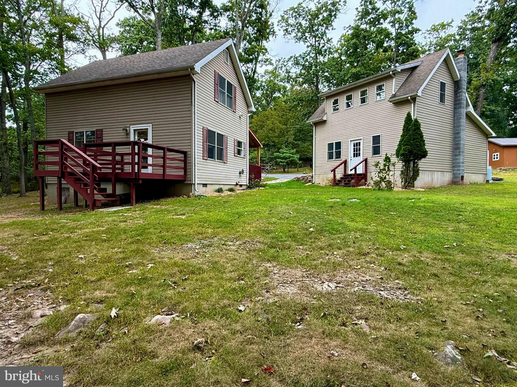348 Trapper Ridge Lane Hedgesville, WV 25427 - Photo 26 of 41 a view of a house with a yard