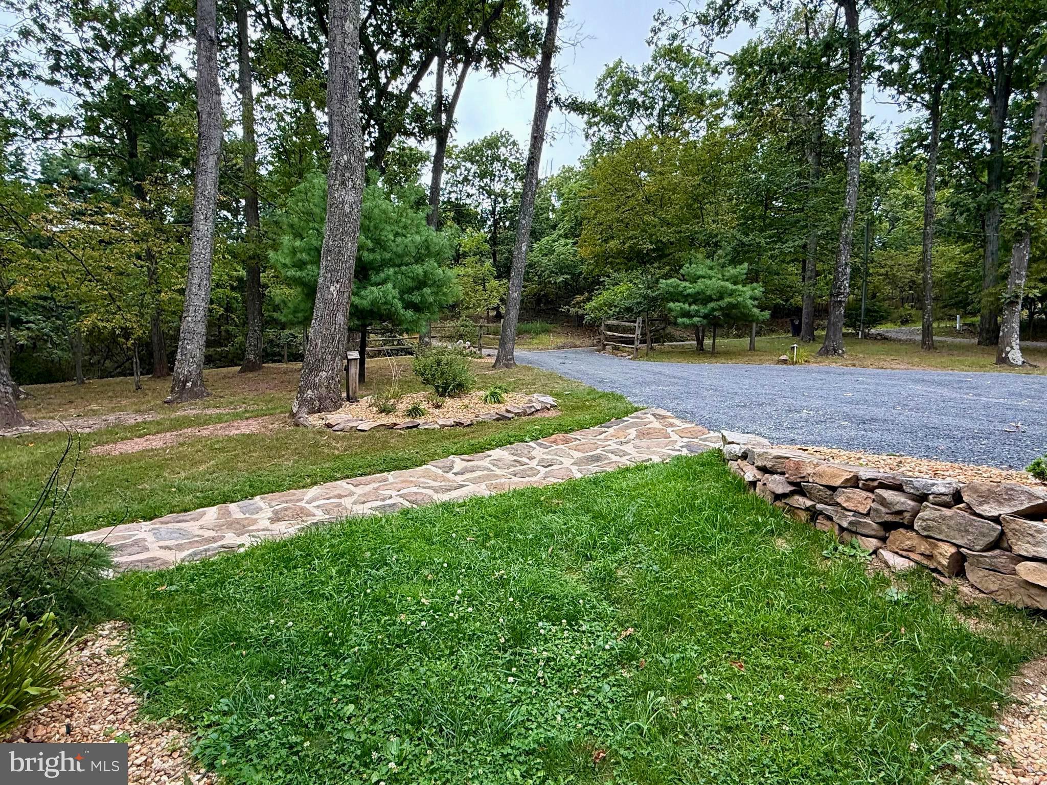 348 Trapper Ridge Lane Hedgesville, WV 25427 - Photo 28 of 41 a view of a park that has large trees