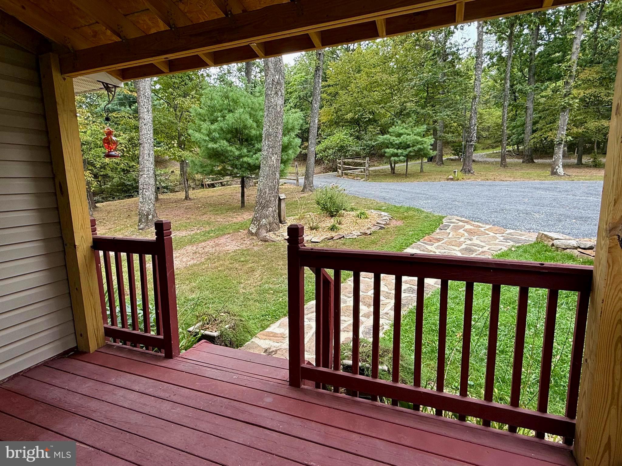 348 Trapper Ridge Lane Hedgesville, WV 25427 - Photo 30 of 41 a view of a porch with wooden floor and outdoor space