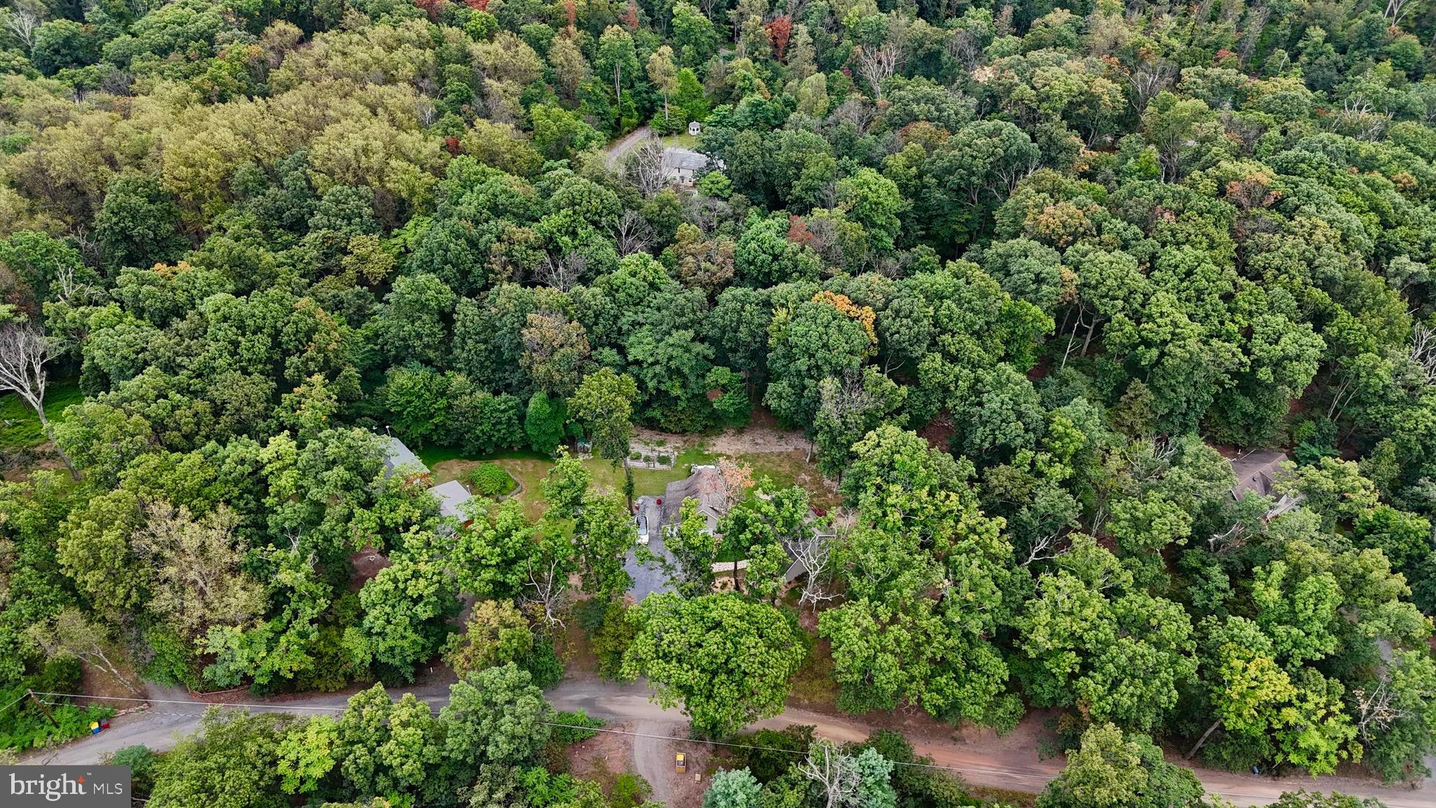 348 Trapper Ridge Lane Hedgesville, WV 25427 - Photo 32 of 41 an aerial view of a house with a yard