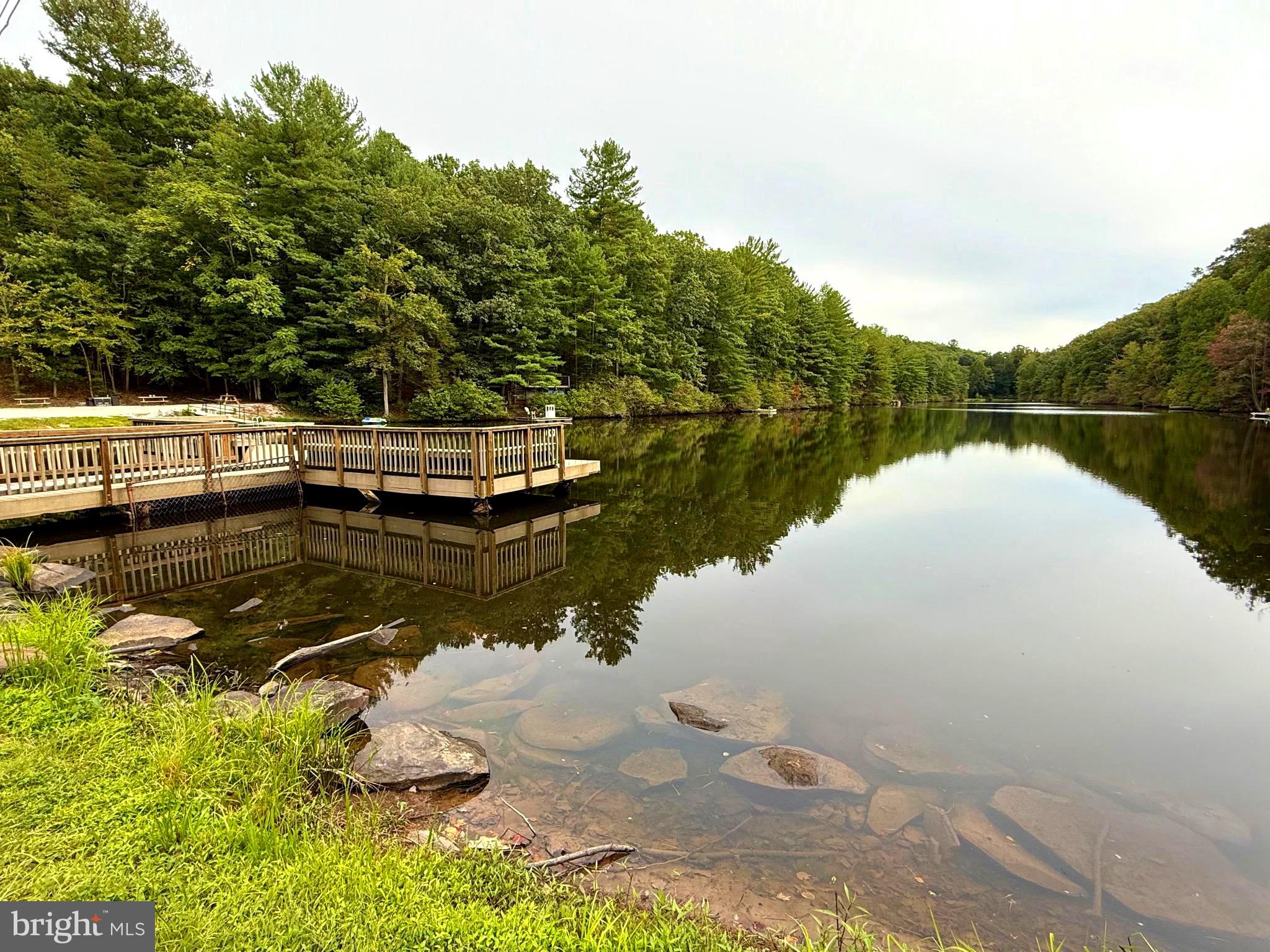 348 Trapper Ridge Lane Hedgesville, WV 25427 - Photo 37 of 41 a view of a lake with a mountain view