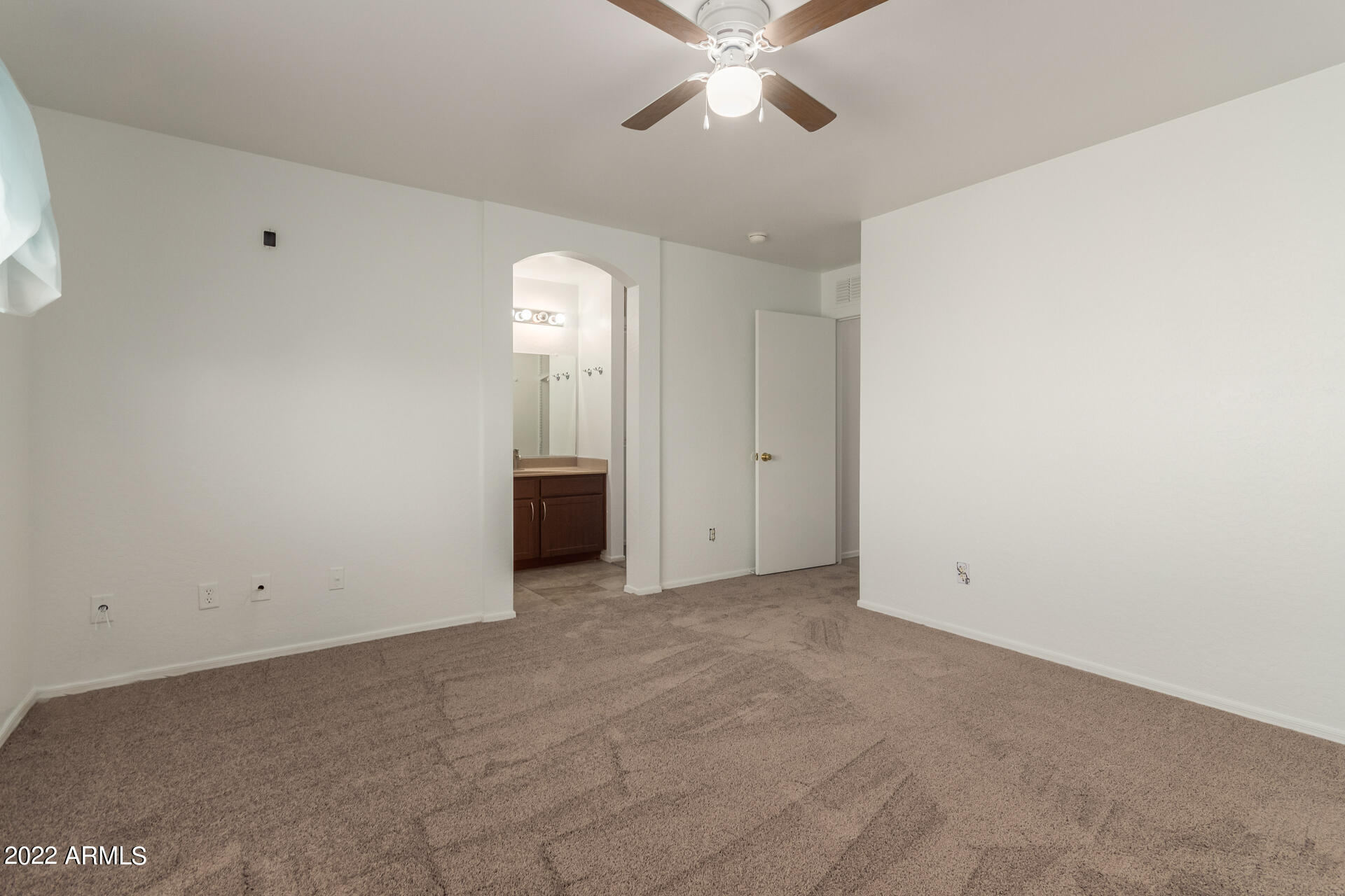 23740 West Grove Street Buckeye, AZ 85326 - Photo 12 of 23 an empty room with chandelier fan