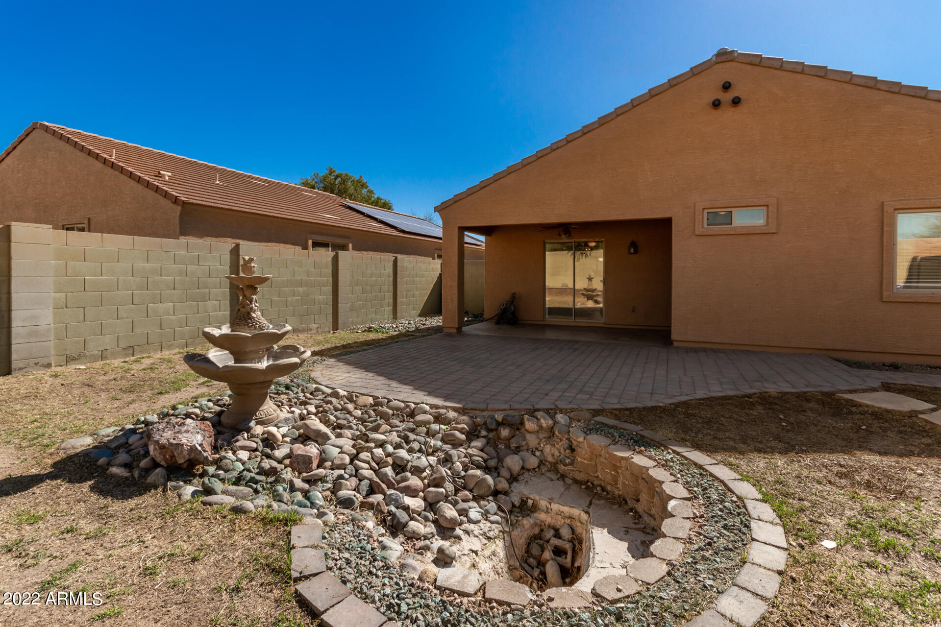 23740 West Grove Street Buckeye, AZ 85326 - Photo 22 of 23 a front view of a house with a yard