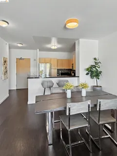 a kitchen with a table and chairs in it