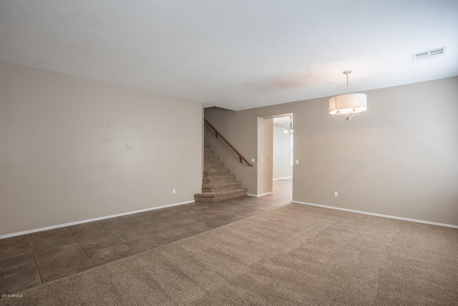 3101 South Joshua Tree Lane Gilbert, AZ 85295 - Photo 15 of 88 a view of an empty room with a fireplace