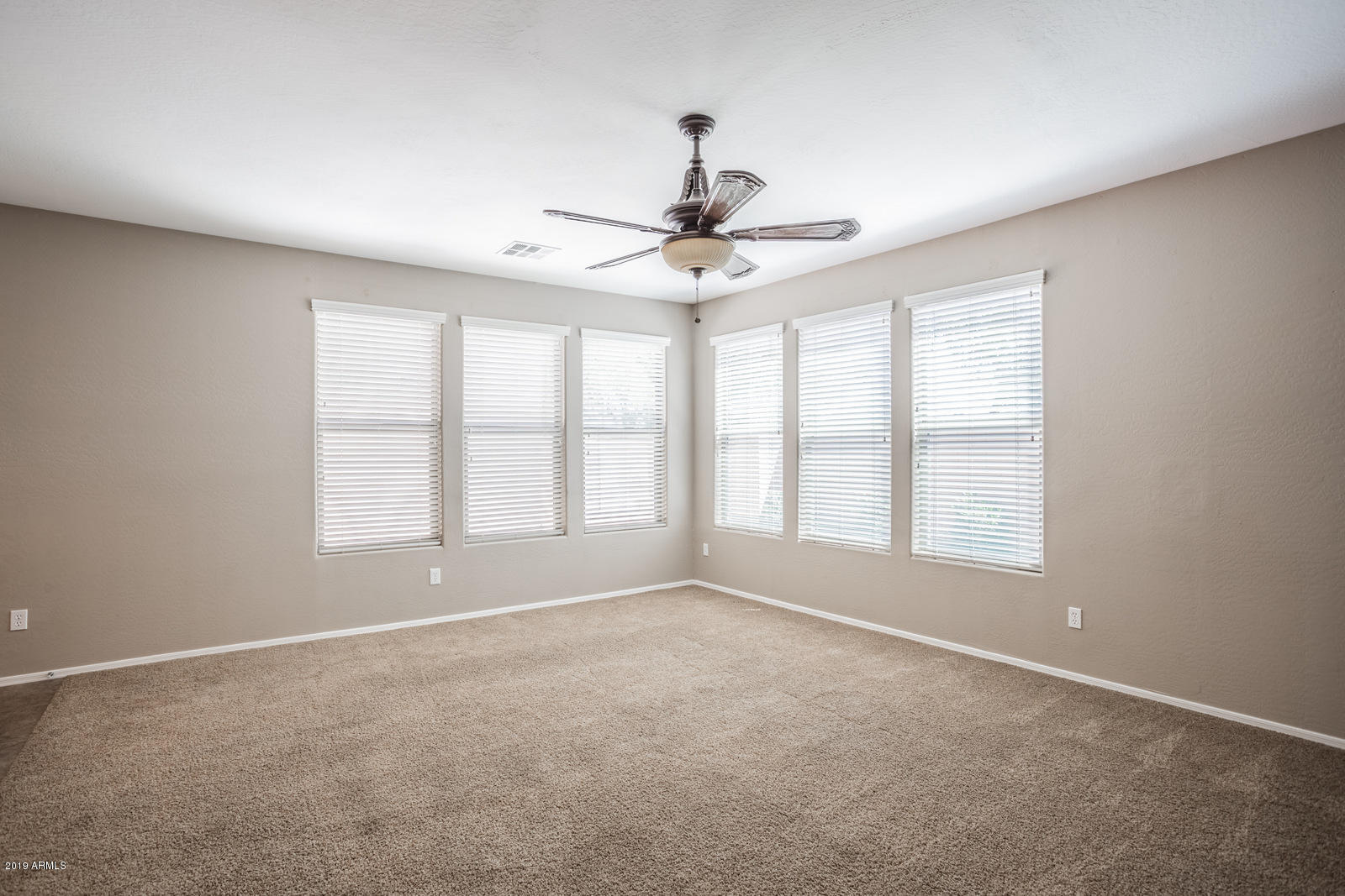 3101 South Joshua Tree Lane Gilbert, AZ 85295 - Photo 35 of 88 a view of an empty room with a window