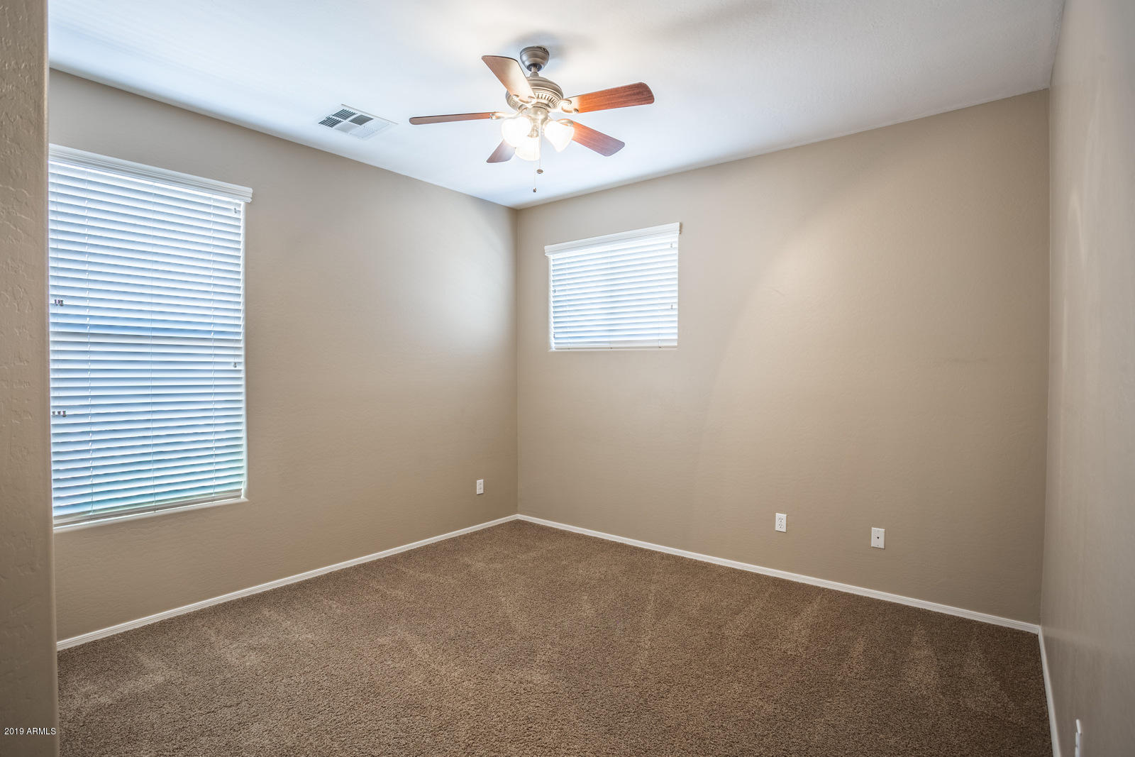 3101 South Joshua Tree Lane Gilbert, AZ 85295 - Photo 46 of 88 an empty room with a window